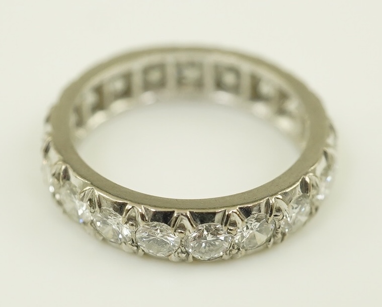 A platinum? and nineteen stone illusion set diamond full eternity ring